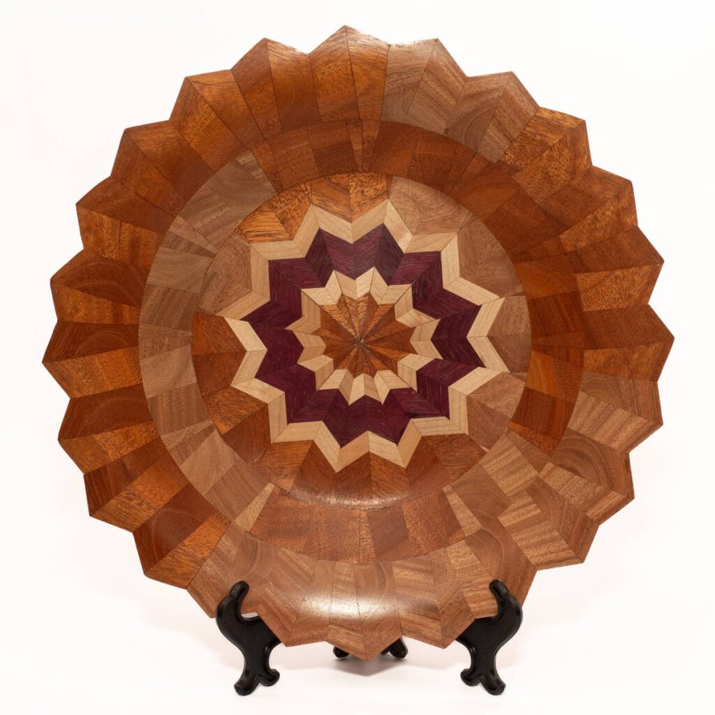 Geometric Wooden Platter with a Zigzag Star Pattern in the Center