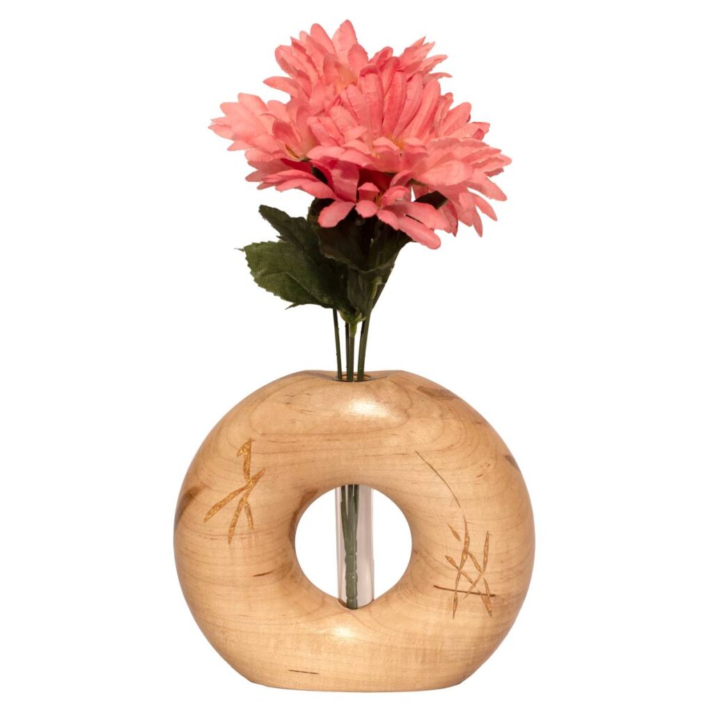 Round Wooden Vase with Hollow Center Holding Pink Flowers