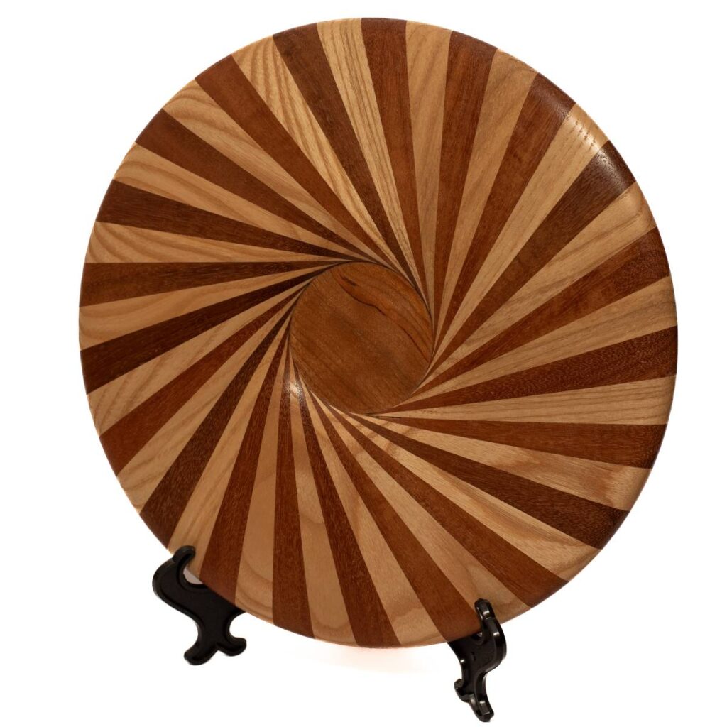 Round Wooden Plate with Geometric Spiral Pattern