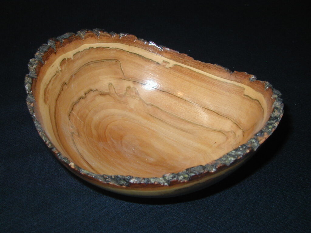 Handcrafted Wooden Bowl with Natural Bark Edge