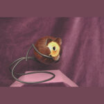 A Handcrafted Wooden Vase with a Flower-Like Carved Rim