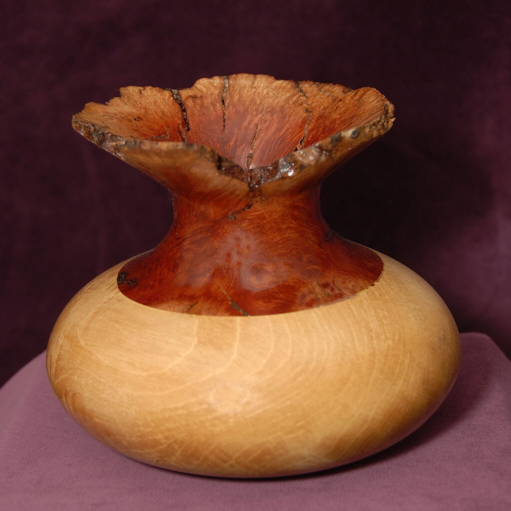 A Handcrafted Wooden Vase with a Smooth