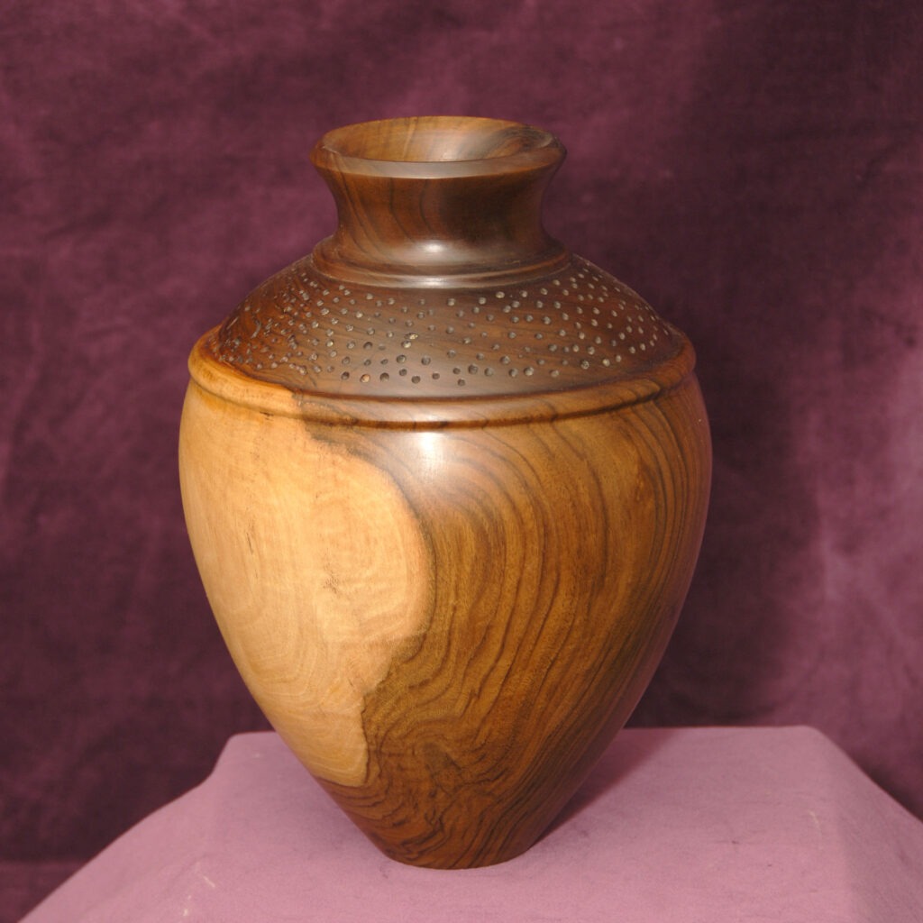 Tall Wooden Vessel with a Smooth Polished Surface